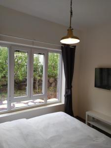 A bed or beds in a room at החן בירוק