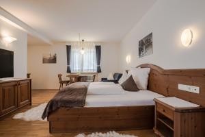 Voodi või voodid majutusasutuse Crëp Sella toas