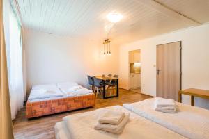 Postel nebo postele na pokoji v ubytování Hotel SKI