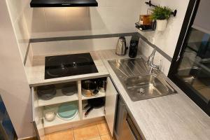 Kuchyňa alebo kuchynka v ubytovaní Exclusiva Villa de Lujo (5*****) en Corralejo - Fuerteventura (Islas Canarias)
