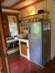 Kuchyň nebo kuchyňský kout v ubytování Palm-covered house in the tropical -Casa Oli