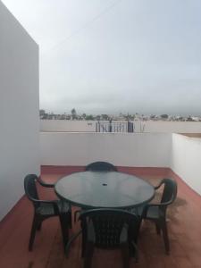 A balcony or terrace at ALCARAVAN 50 Még 22 kép