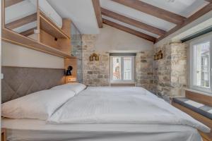 Posteľ alebo postele v izbe v ubytovaní Palace Luxury Retreat