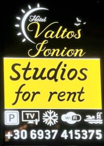 a sign for a latinas reunion studios for rent at Valtos Ionion in Parga