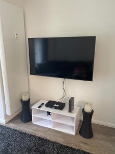 Телевизор и/или развлекательный центр в Luxus Apartament