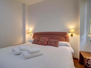 A bed or beds in a room at VUELTA A CASA de Alma de Nieve