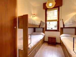 A bed or beds in a room at VUELTA A CASA de Alma de Nieve
