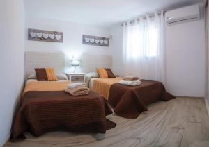 Posteľ alebo postele v izbe v ubytovaní La casita de Marbella