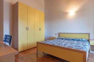 Posteľ alebo postele v izbe v ubytovaní Appartamento al Sol Grauno Ospitar