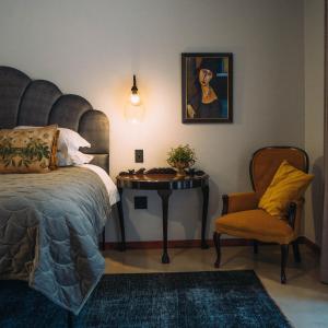 The Bohemian Guesthouse客房内的一张或多张床位