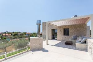 Balkón nebo terasa v ubytování Manitennisvillas