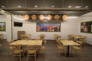 Un restaurant sau alt loc unde se poate mânca la "Corte Mopps" città della ceramica Grottaglie - SPA Elysium