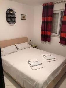 Posteľ alebo postele v izbe v ubytovaní Apartments Marija Max