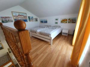 Postel nebo postele na pokoji v ubytování Apartments Podlesek