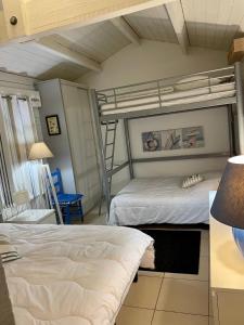 Postel nebo postele na pokoji v ubytování Coté Ouest