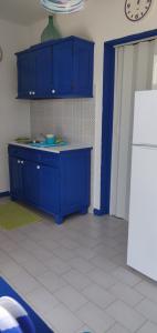 A kitchen or kitchenette at La Casa di Chico