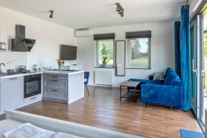Kuchyňa alebo kuchynka v ubytovaní Apartamenty Zielona Lipka