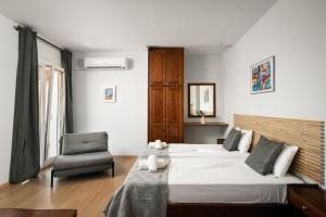 Posezení v ubytování Folies Corfu Town Hotel Apartments