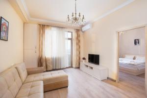 Postel nebo postele na pokoji v ubytování Yerevan Comfort on Argishti 11