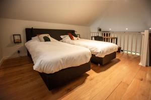 Postel nebo postele na pokoji v ubytování Hotel - B&B Elementum