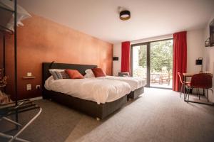 Postel nebo postele na pokoji v ubytování Hotel - B&B Elementum