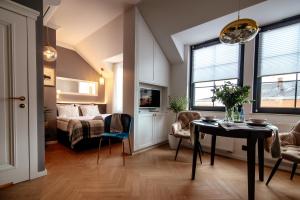Łóżko lub łóżka w pokoju w obiekcie Apartamenty Stare Miasto Zamość, Prywatny Parking, Winda