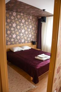Postelja oz. postelje v sobi nastanitve Vao Guesthouse