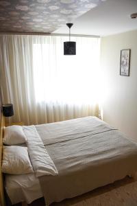 Postelja oz. postelje v sobi nastanitve Vao Guesthouse