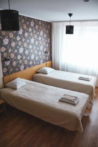 Postel nebo postele na pokoji v ubytování Vao Guesthouse + 15 fotografií