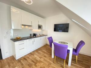 Kuchyňa alebo kuchynka v ubytovaní Steiner Residences Vienna Nestroyplatz