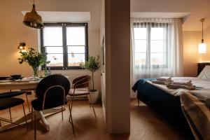 Łóżko lub łóżka w pokoju w obiekcie Apartamenty Stare Miasto Zamość, Prywatny Parking, Winda
