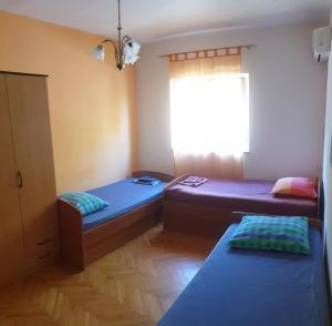 Postel nebo postele na pokoji v ubytování Eros Rooms