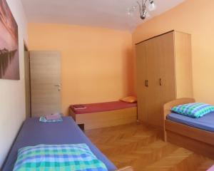 Postel nebo postele na pokoji v ubytování Eros Rooms