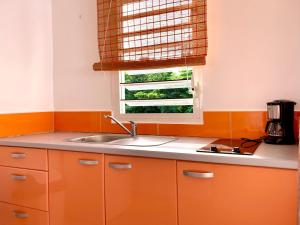 Nhà bếp/bếp nhỏ tại Residence Soleil Demery