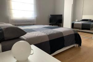 A bed or beds in a room at Il Villino in città