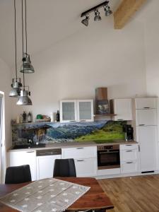 Kuchyň nebo kuchyňský kout v ubytování Alpenblick