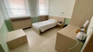 Кровать или кровати в номере Domus Helena