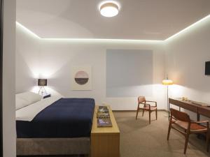 Voodi või voodid majutusasutuse Savamala b&b toas