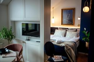 Telewizja i/lub zestaw kina domowego w obiekcie Apartamenty Stare Miasto Zamość, Prywatny Parking, Winda