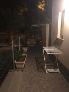 Patio alebo iná vonkajšia časť ubytovania Casa vacanza Nonna Sarina