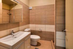 Kúpeľňa v ubytovaní Marini Luxury Apartments and Suites