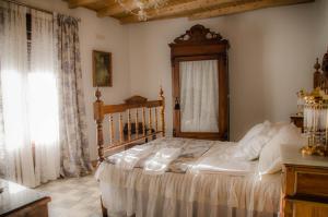 Posteľ alebo postele v izbe v ubytovaní Casa Rural La CasAna