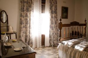 Posteľ alebo postele v izbe v ubytovaní Casa Rural La CasAna