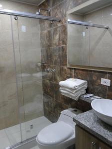 Koupelna v ubytování Hotel Esmeralda Plaza