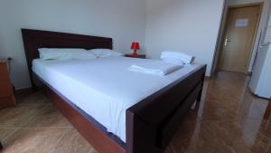 Voodi või voodid majutusasutuse Vila Riand toas