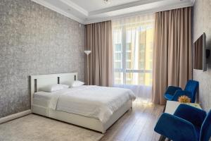 Imagen de la galería de RAISSON APARTHOTEL B104 Хан Шатыр, en Astana