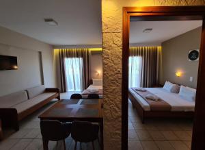 Postel nebo postele na pokoji v ubytování Abella Hotel