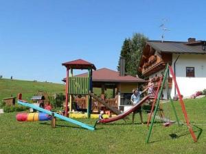 a group of children playing on a playground at Haus-Spannbauer-Wohnung-Dreisessel in Altreichenau