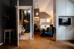 Telewizja i/lub zestaw kina domowego w obiekcie Apartamenty Stare Miasto Zamość, Prywatny Parking, Winda