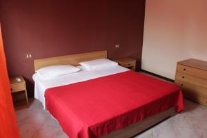 Ένα ή περισσότερα κρεβάτια σε δωμάτιο στο Appartamento a due passi da Mantova